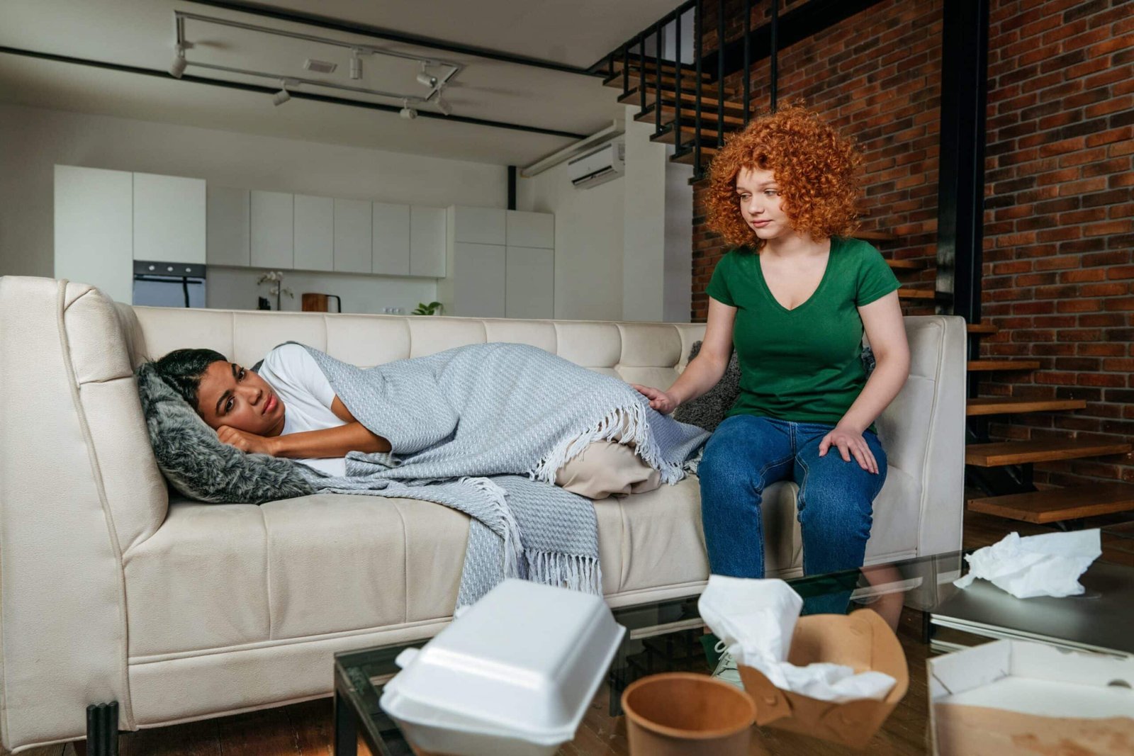 Young woman supporting her friend in depression